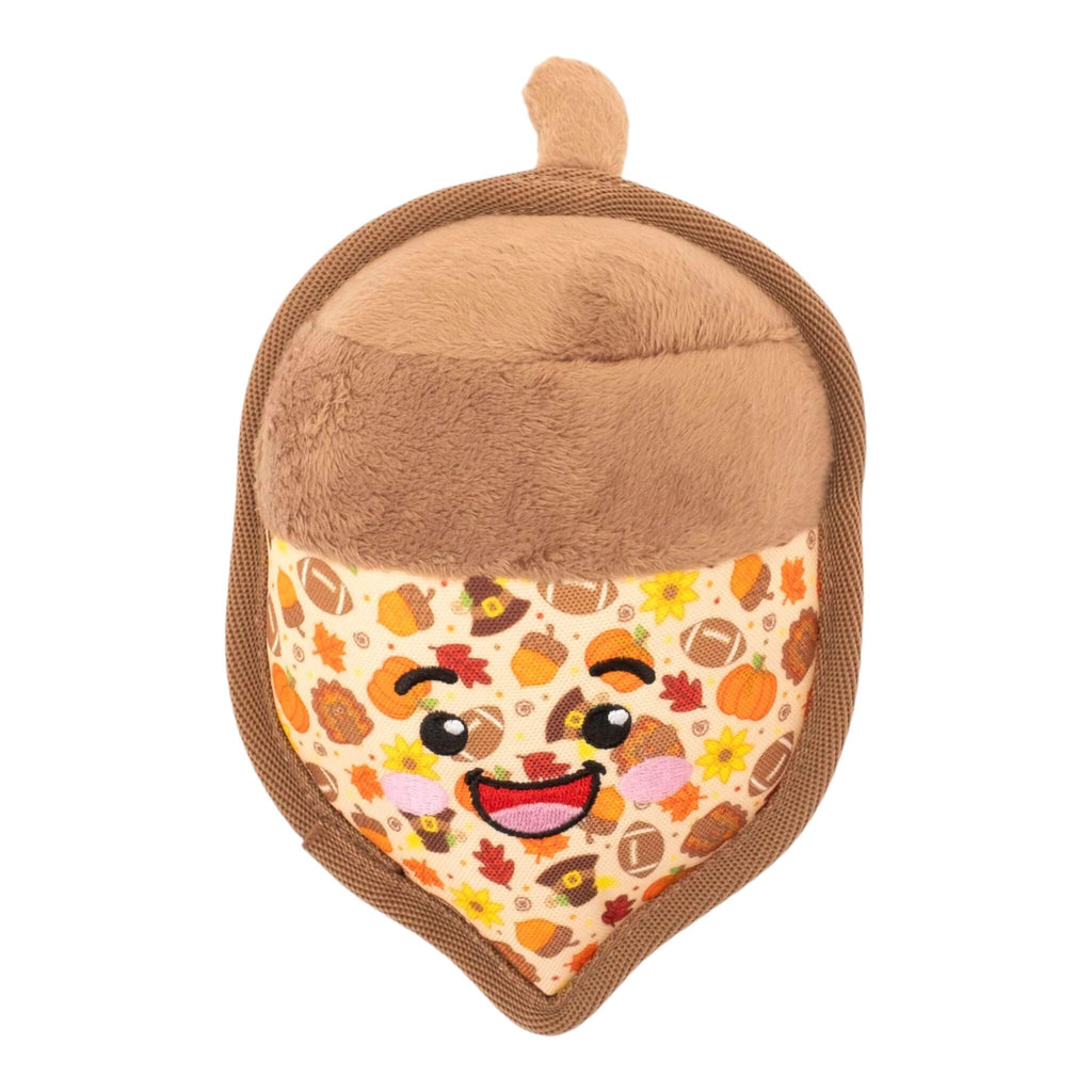 Plush acorn toy with a smiling face on a white background