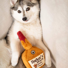 Load image into Gallery viewer, Dog snuggles with his Barker&#39;s Mark Plush Dog Toy
