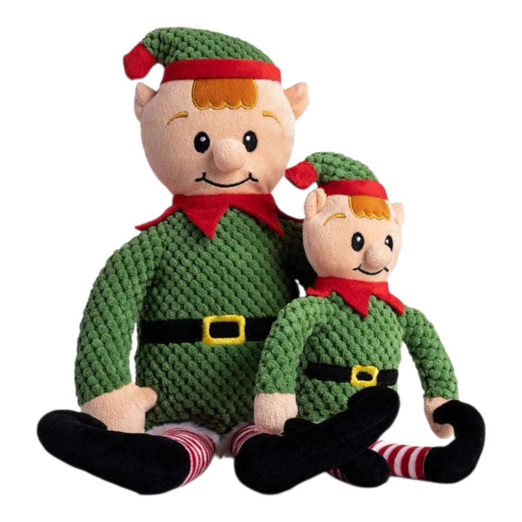 Two plush elf toys with green outfits and red hats on a white background
