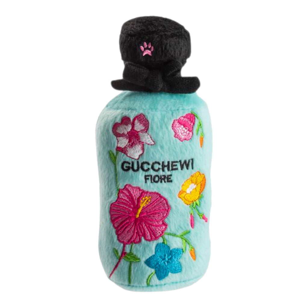 Floral bottle-shaped toy with 'Gucchewi' branding on a white background
