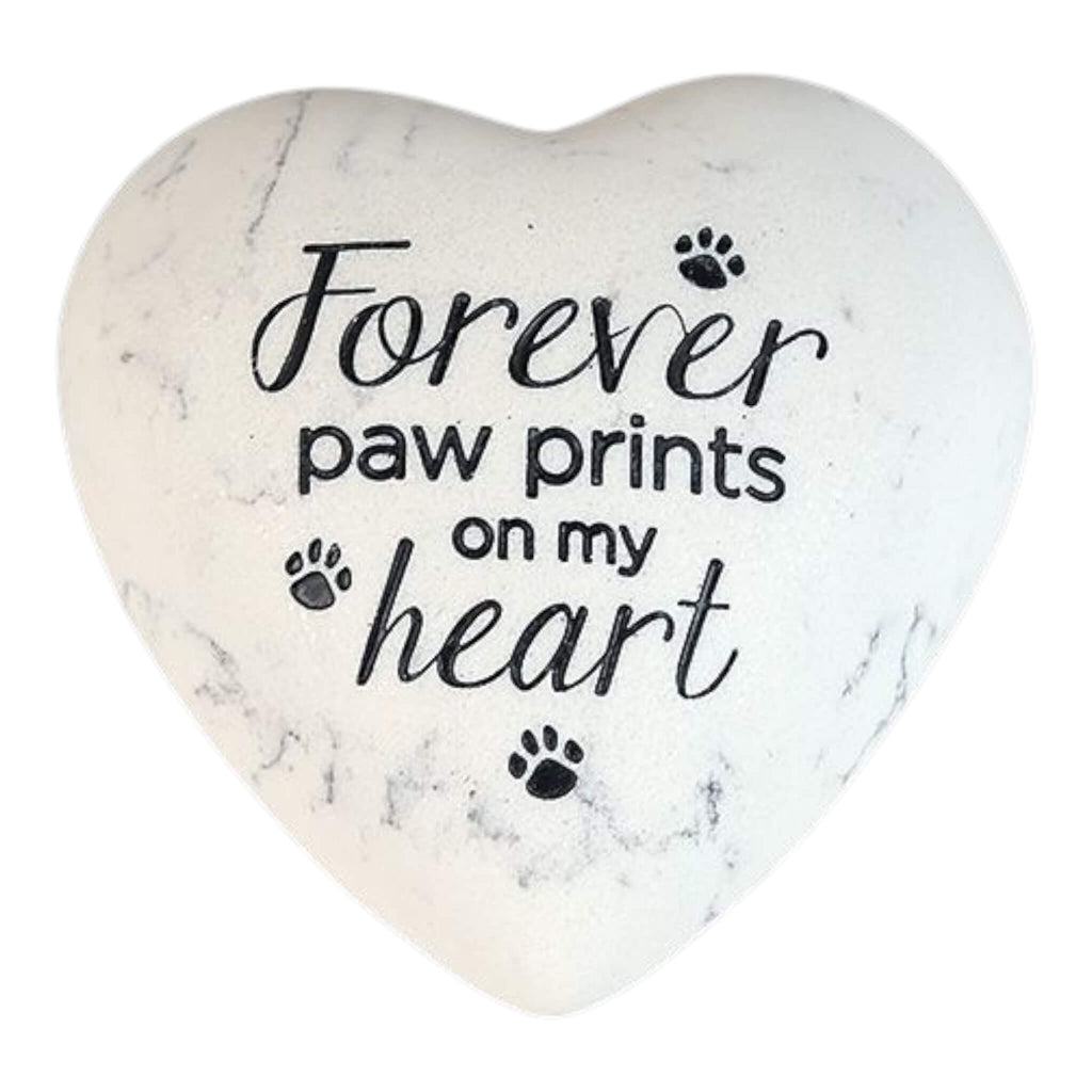 Heart-shaped stone with 'Forever paw prints on my heart' text and paw prints on a white background