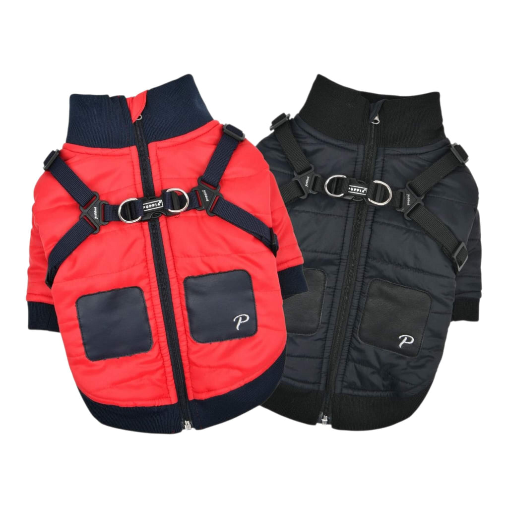 Red and black winter dog coats with harnesses on a white background