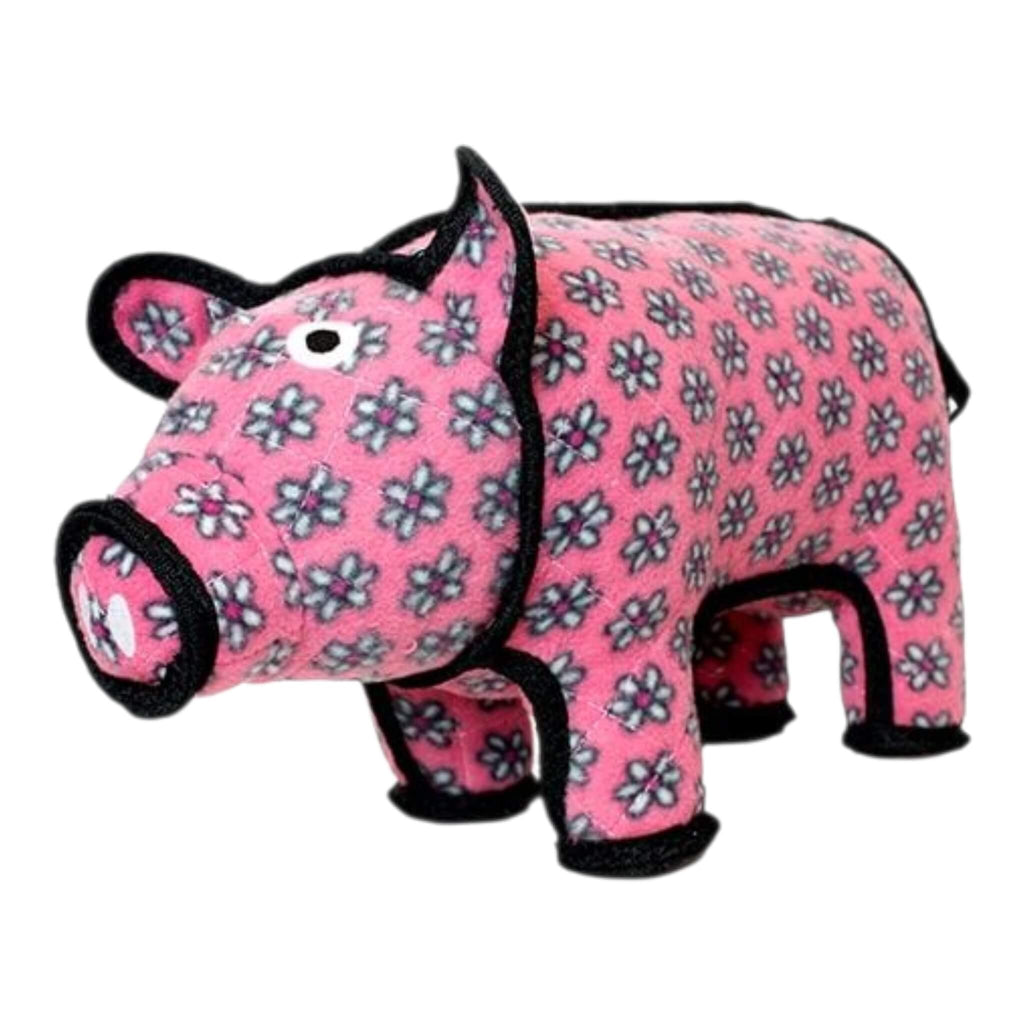 Pink pig dog toy with floral pattern on a white background