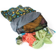 Load image into Gallery viewer, Stuff old clothes and blankets into a stuff sack
