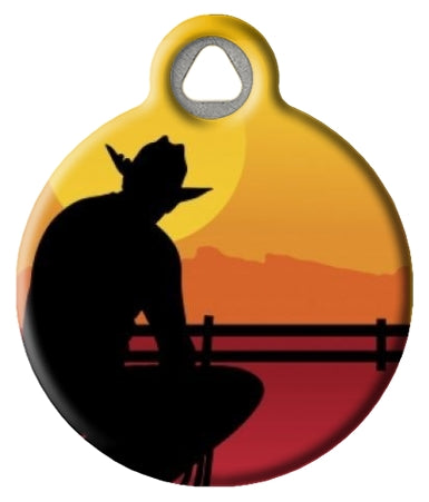 Pet id tag featuring a cowboy silhouette watching a beautiful sunset