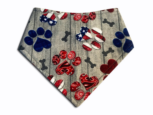 Independence Paws Dog Bandana with red, white and blue pawprints, hearts and bones